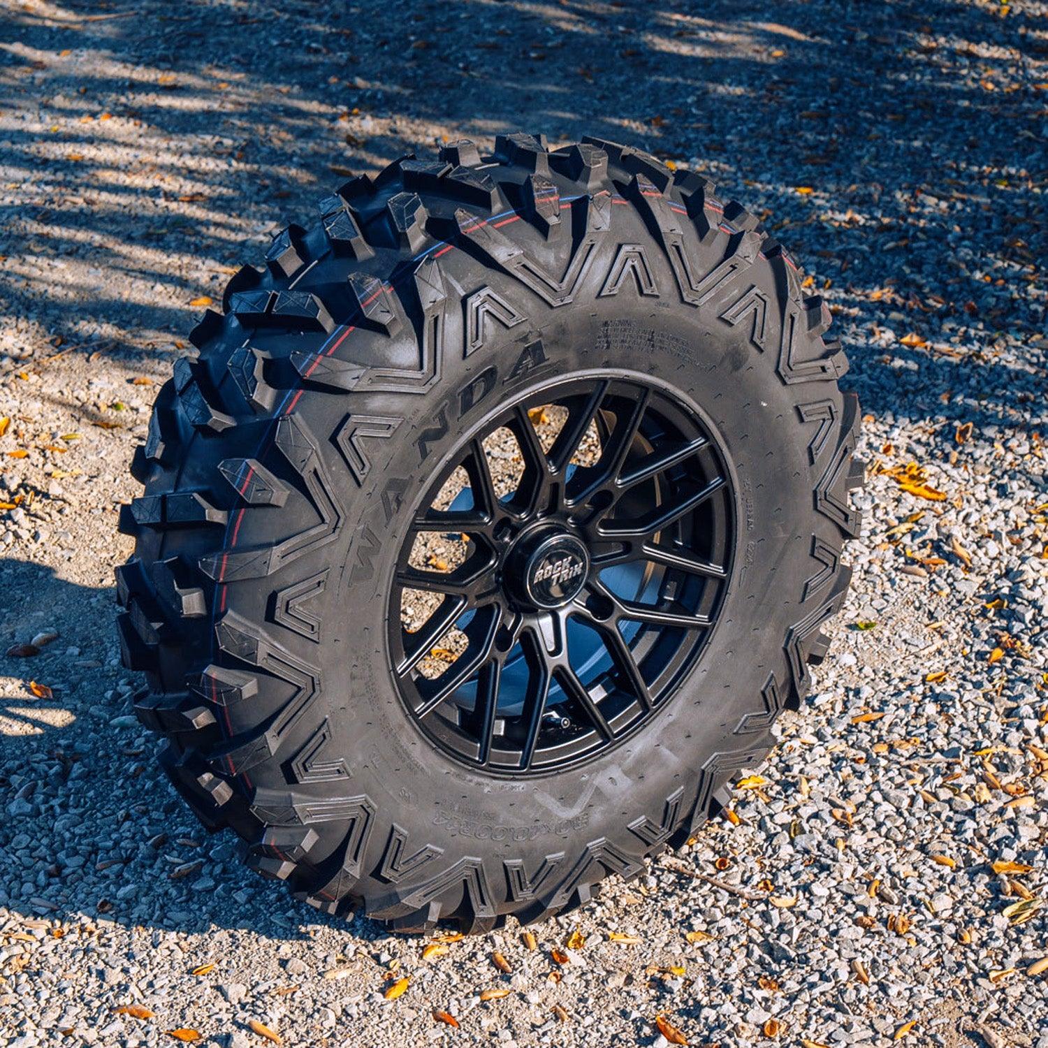 Rocktrix RT104 - 14x7 (ET10) 4x156 131 Black + 30x10R14 Tire