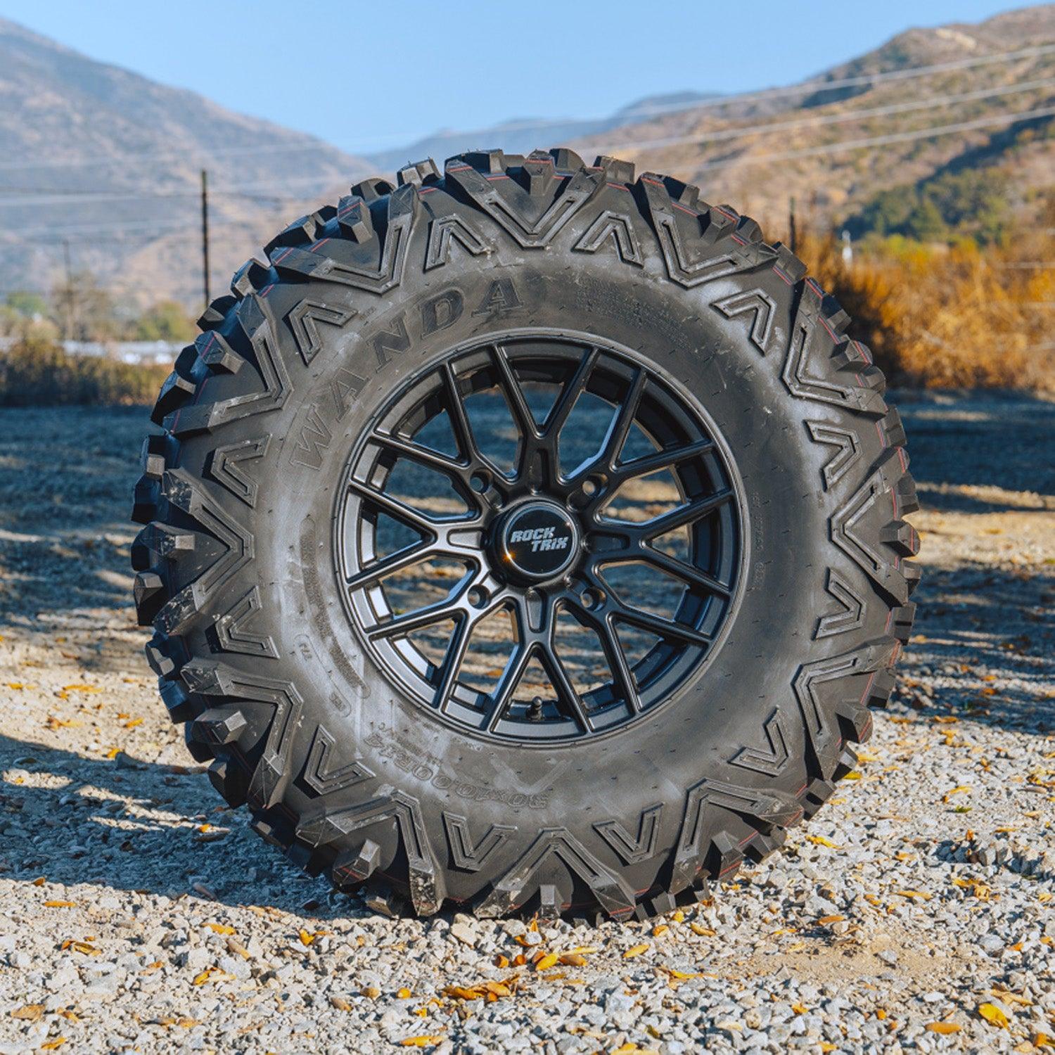 Rocktrix RT104 - 14x7 (ET10) 4x156 131 Black + 30x10R14 Tire