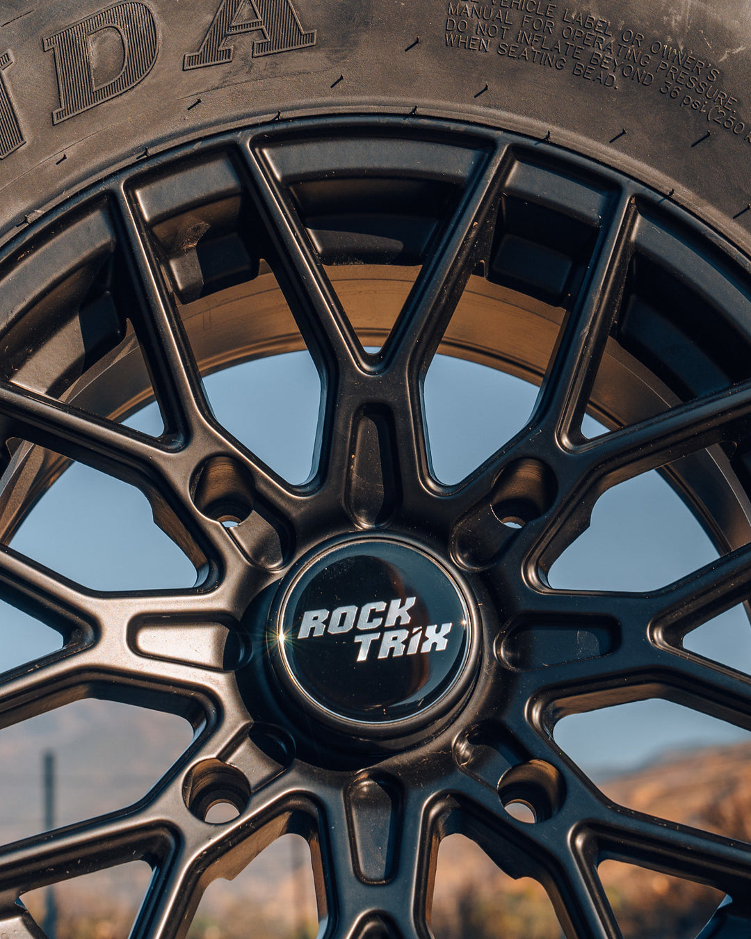 Rocktrix offroad wheel RT104 14x7 4x156 rim with 30x10-14 Tire 6-ply, radial. For ATV, UTV, compatible with Polaris