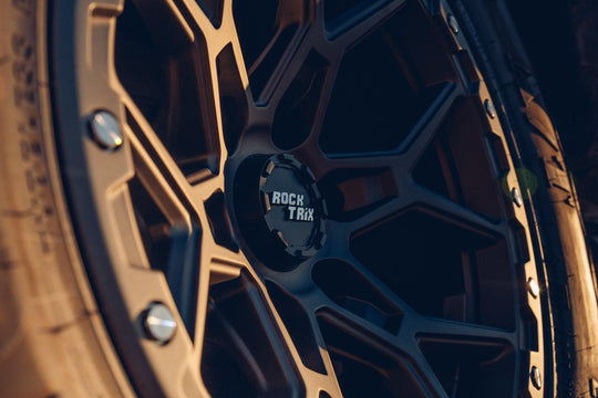 RT107 Matte Gunmetal 17x9 rim on Toyota Tacoma TRD Pro - Rocktrix Offroad Wheel Center cap - Rugged.