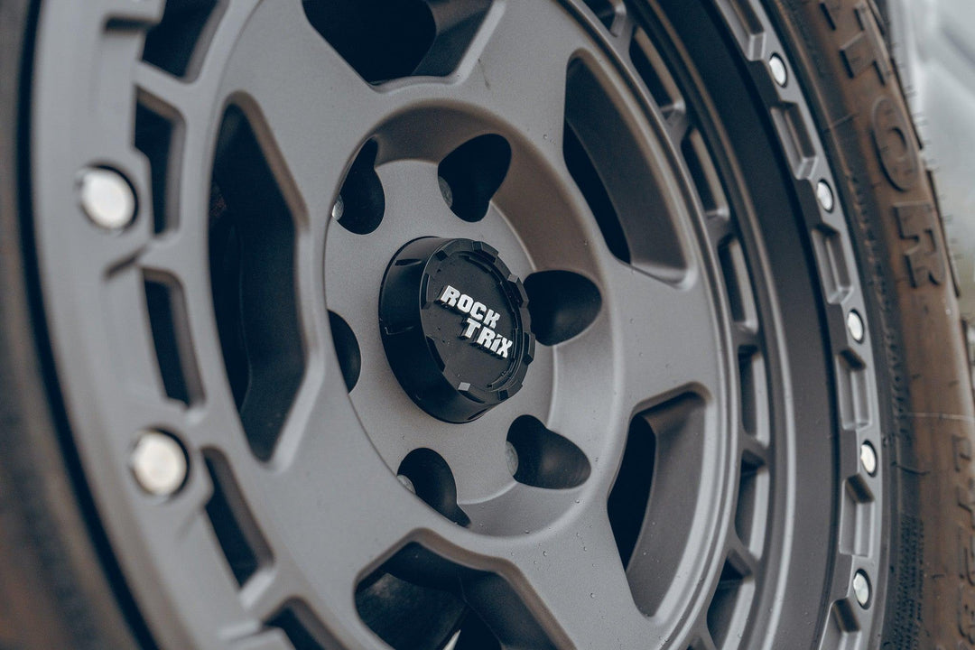 RT115 Matte Gunmetal 17x9 rim on Toyota Tacoma TRD Pro - Rocktrix Offroad Wheel Center Cap - Rugged.