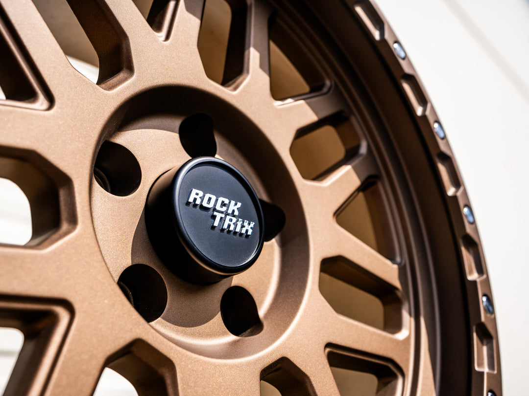 Rocktrix Wheel Center Cap - Embossed, Black, on RT110 Matte Bronze Wheel
