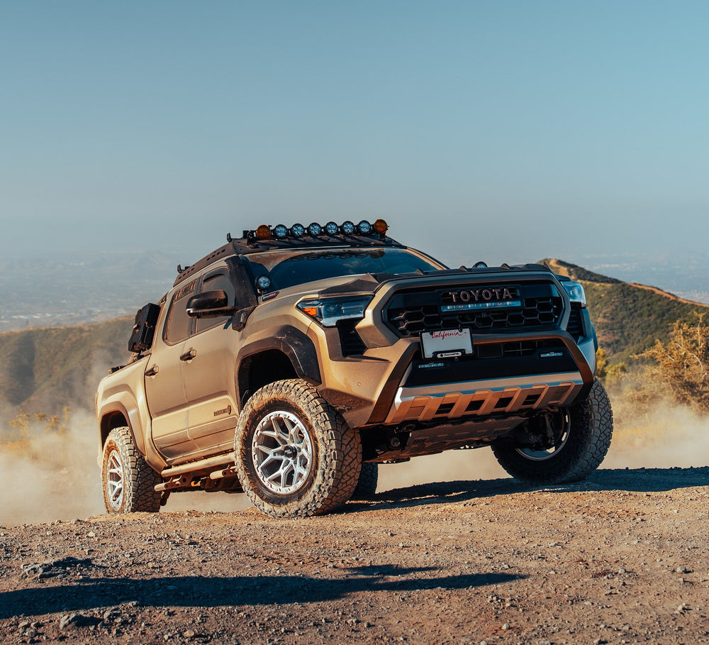 Rocktrix RT107 17x9 Machined Silver wheels on a Toyota Tacoma Trailhunter